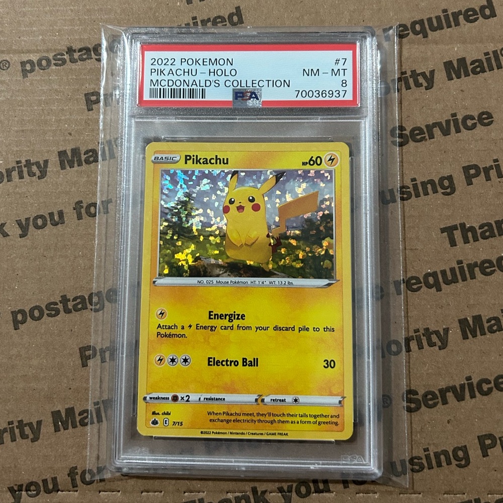 PSA 8 ‘22 Pokemon x Mc Donald’s Pikachu Holo Card No. 7